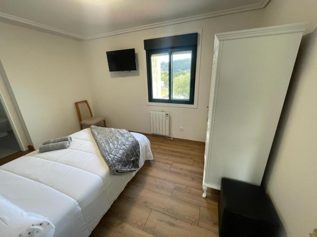 Cama o camas de una habitación en Posada Celtia