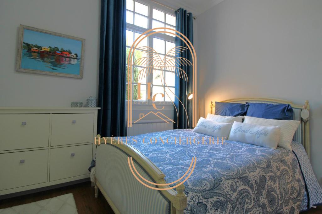 Ein Bett oder Betten in einem Zimmer der Unterkunft La demeure 3 étoiles Du Mont des Oiseaux By HC