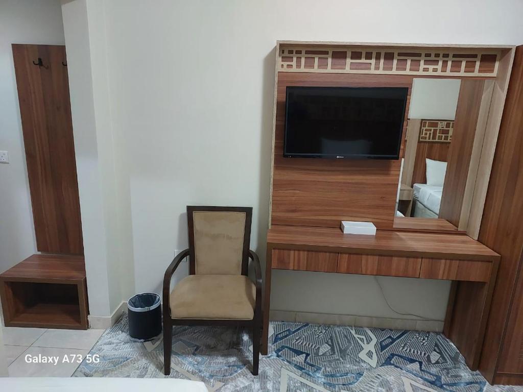 TV a/nebo společenská místnost v ubytování فندق اسكنت العزيزيه - Askant Al Azizyia Hotel