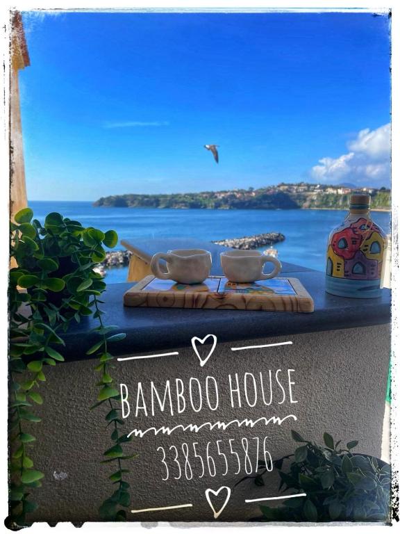 znak dla bankietu z widokiem na ocean w obiekcie Bamboo House w mieście Procida