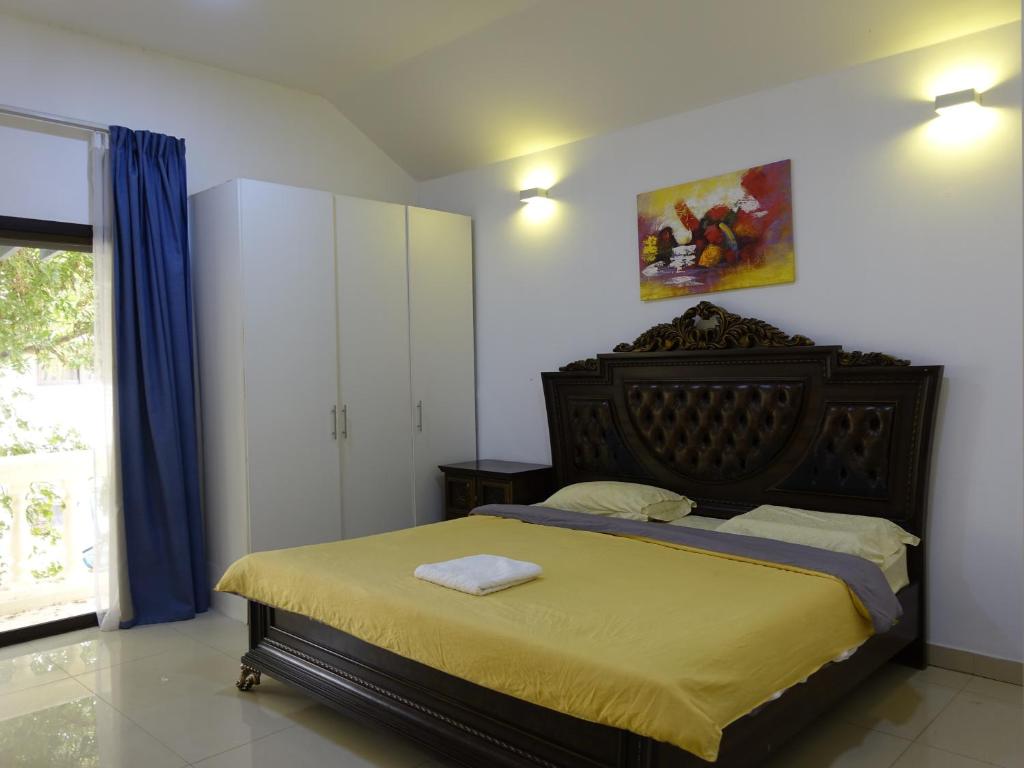 a bedroom with a large bed and a window at Beautiful Cool Room for Coupls & faimly in Dubai