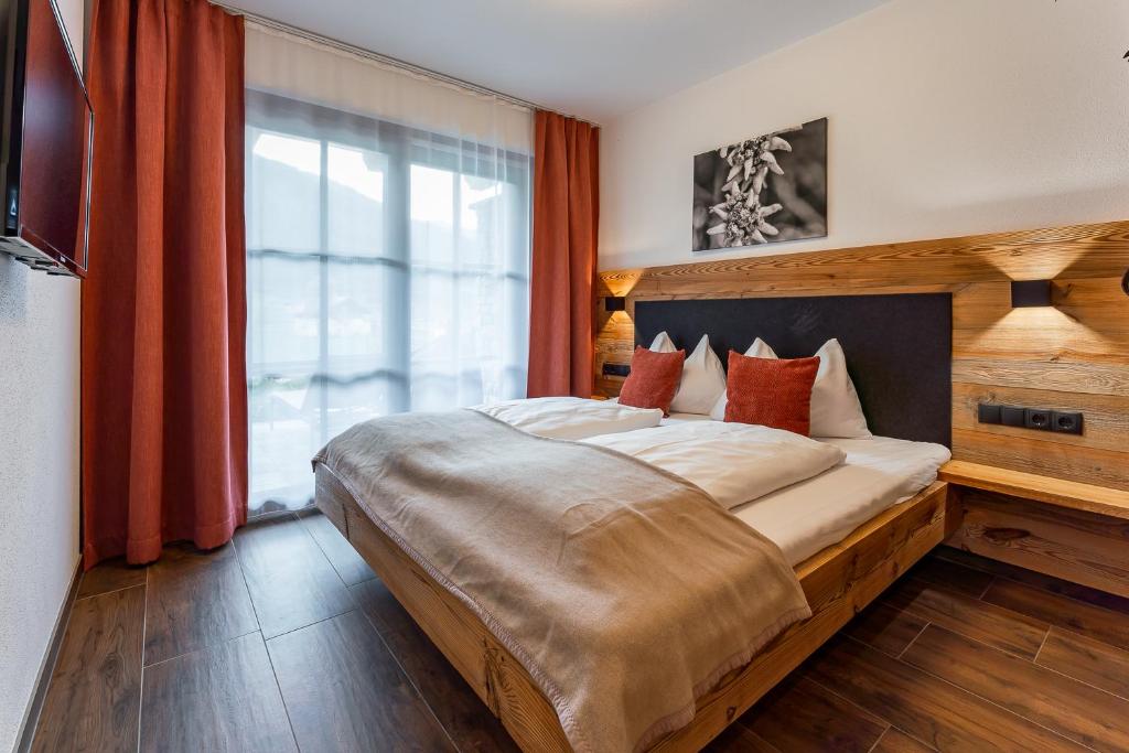 Postel nebo postele na pokoji v ubytování Chalet Edelweiss