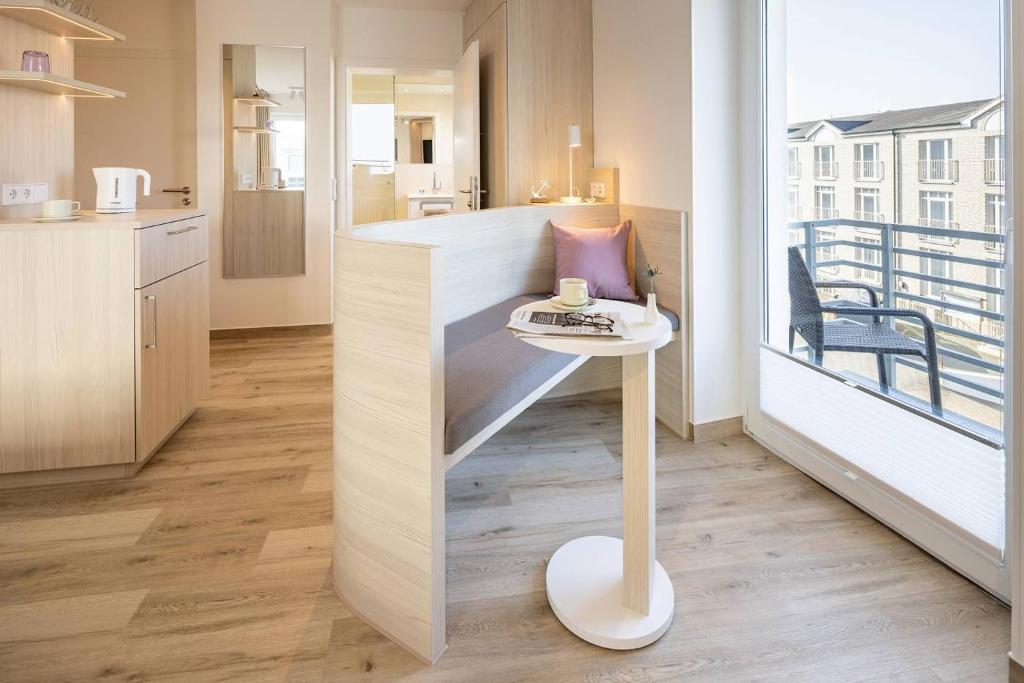 Kuchyň nebo kuchyňský kout v ubytování Hotel Stranddistel