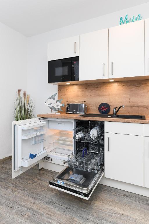 Kuchyň nebo kuchyňský kout v ubytování Haus Strandkorb mit Frühstücksoption