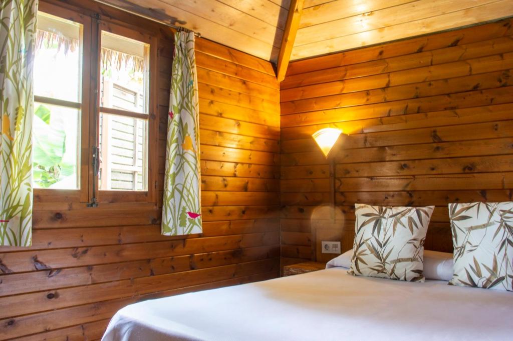 Postel nebo postele na pokoji v ubytování Sangulí Camping & Resort