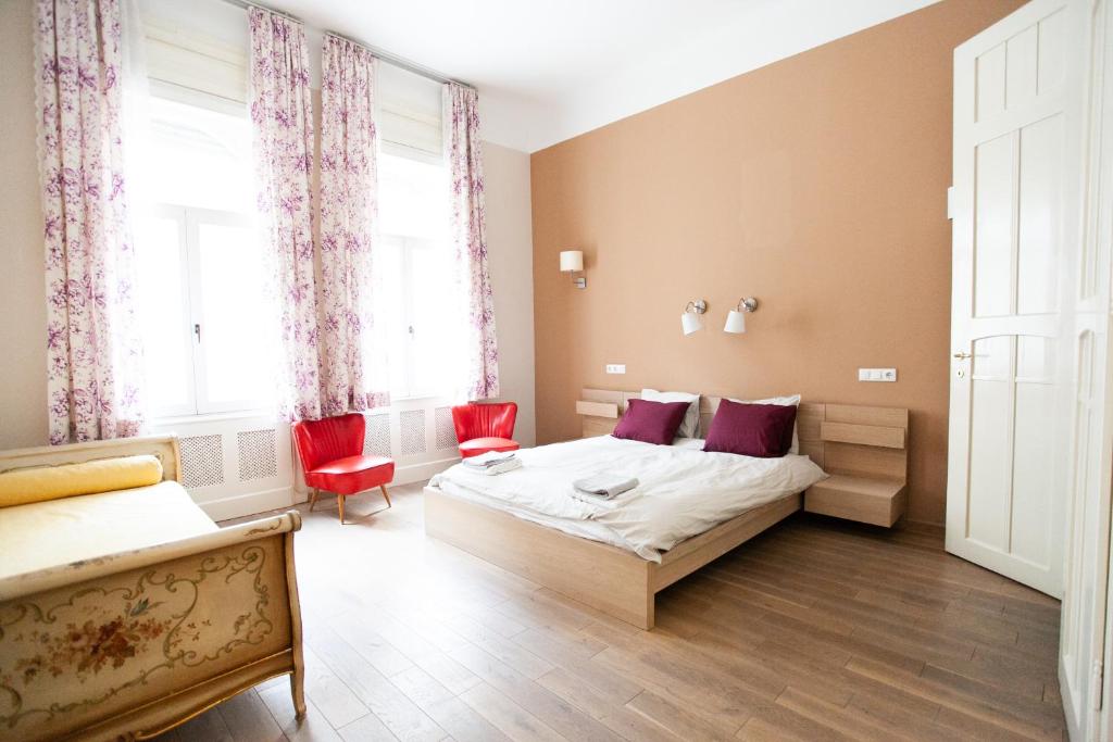 En eller flere senge i et værelse på Elisabeth apartment