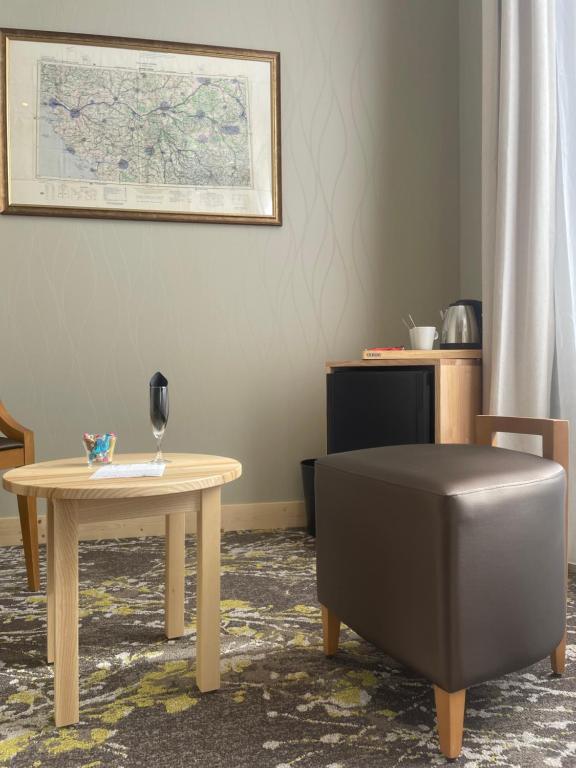 Příslušenství pro přípravu čaje a kávy v ubytování Hotel Le Cercle