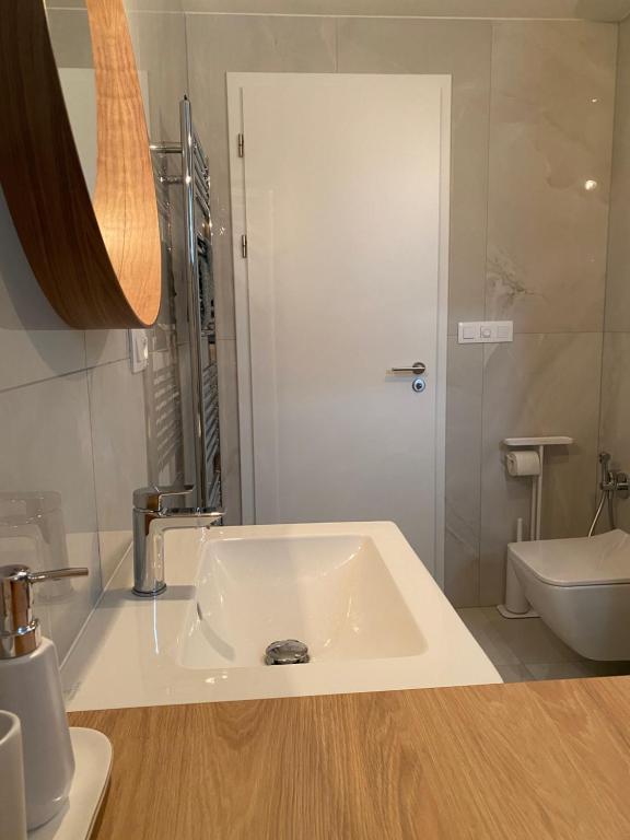 Koupelna v ubytování Apartman s terasou, v novostavbe