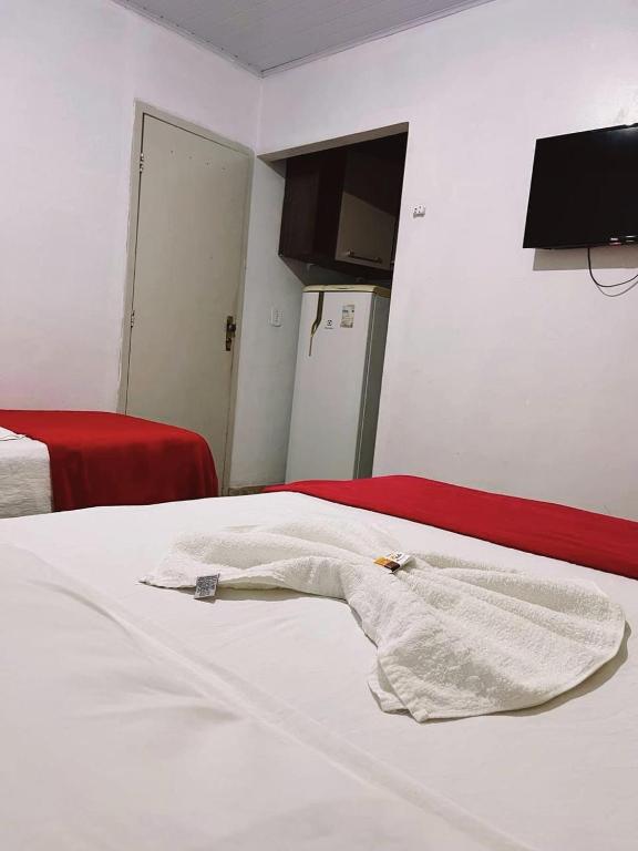 Postel nebo postele na pokoji v ubytování Pousada da Maira