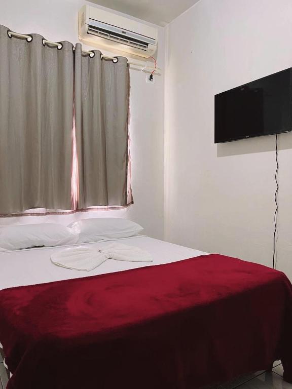 Postel nebo postele na pokoji v ubytování Pousada da Maira