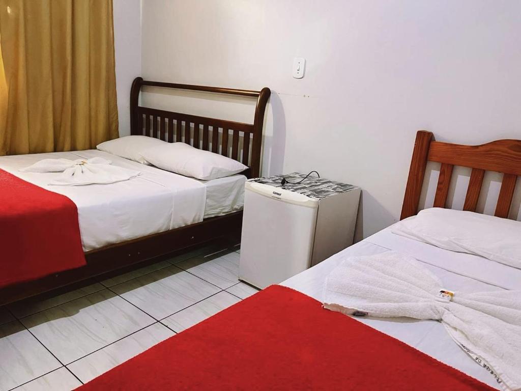 Postel nebo postele na pokoji v ubytování Pousada da Maira