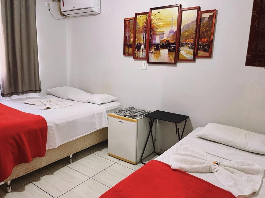 Postel nebo postele na pokoji v ubytování Pousada da Maira