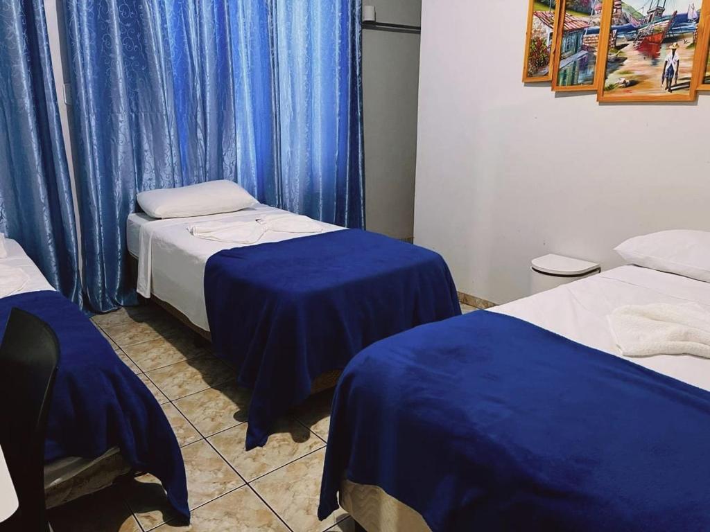 Postel nebo postele na pokoji v ubytování Pousada da Maira