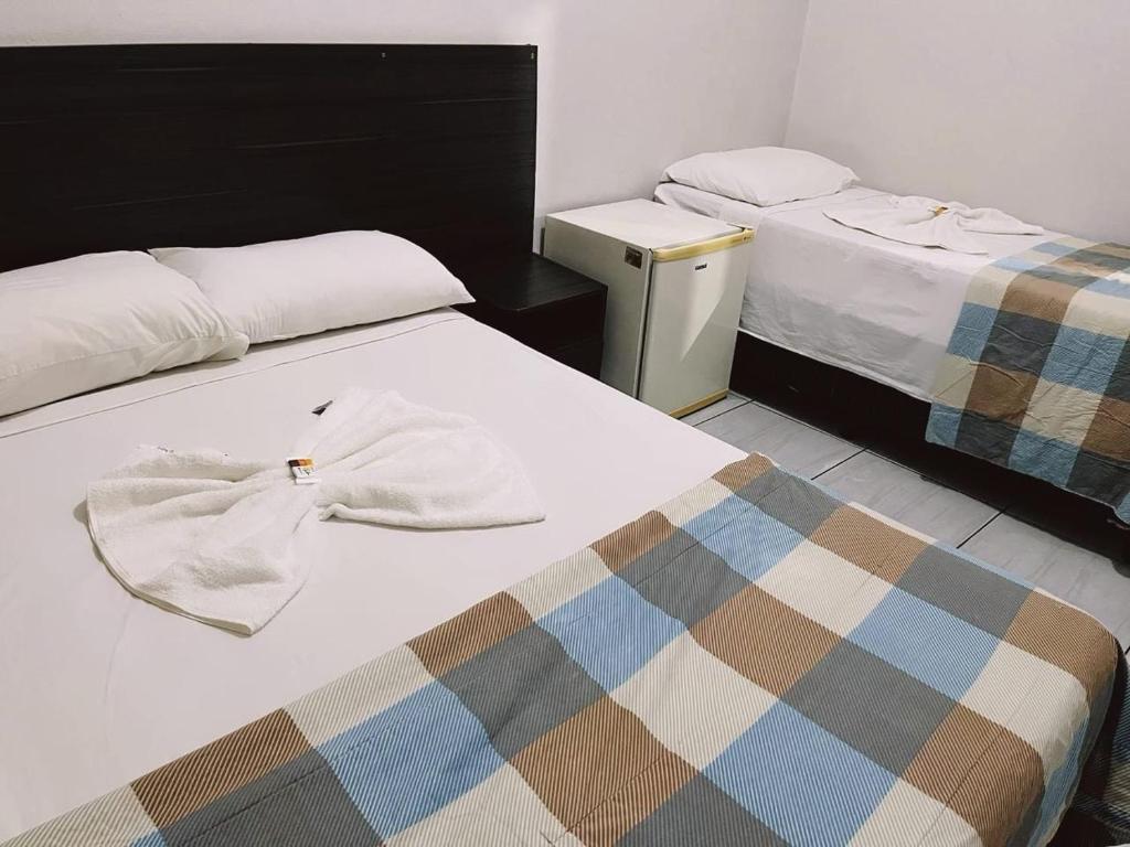 Postel nebo postele na pokoji v ubytování Pousada da Maira