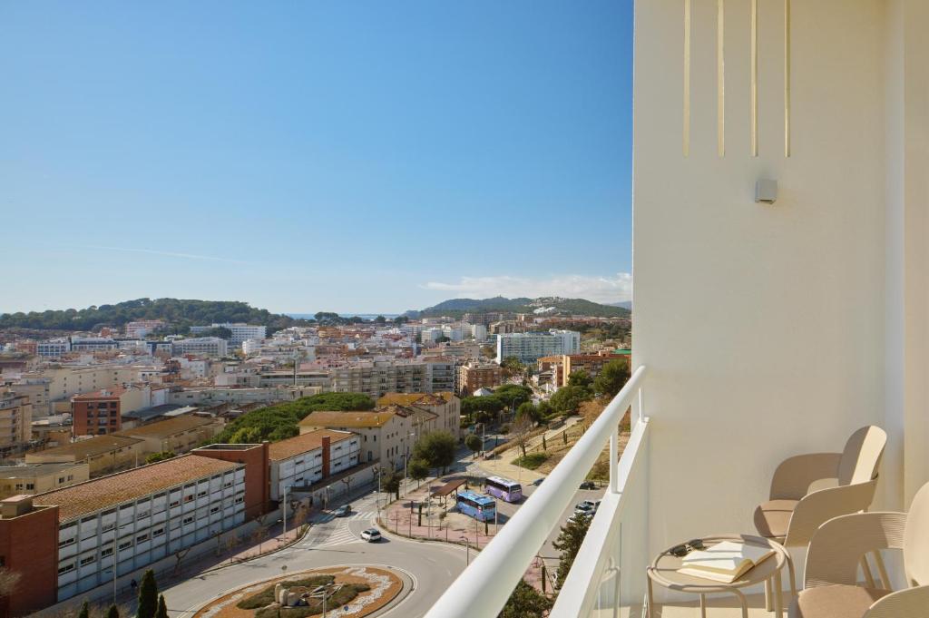 a view of a city from a balcony at Meliá Lloret de Mar in Lloret de Mar