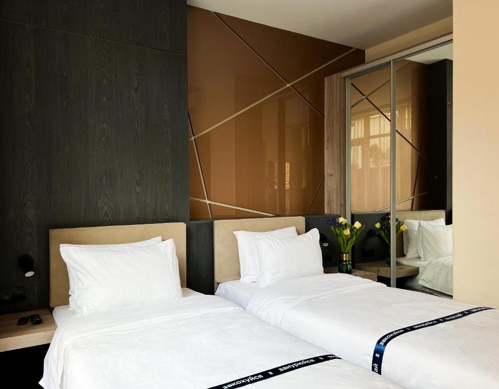 Postel nebo postele na pokoji v ubytování Ribas Rooms Odesa