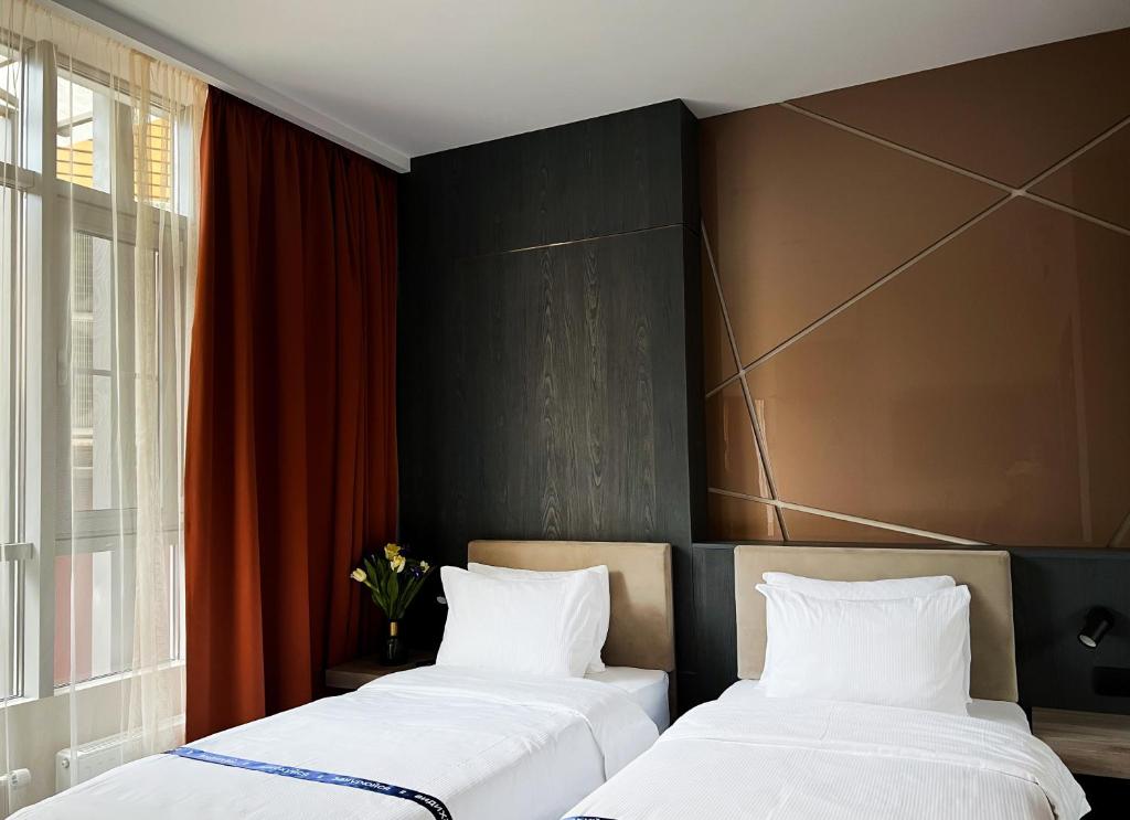 Postel nebo postele na pokoji v ubytování Ribas Rooms Odesa