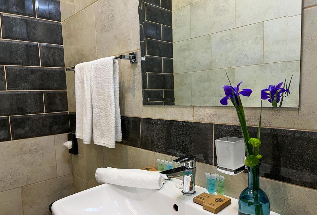 Koupelna v ubytování Ribas Rooms Odesa
