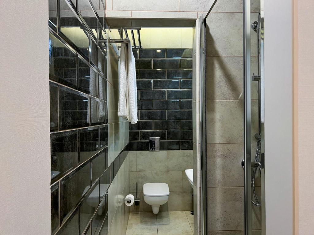 Koupelna v ubytování Ribas Rooms Odesa
