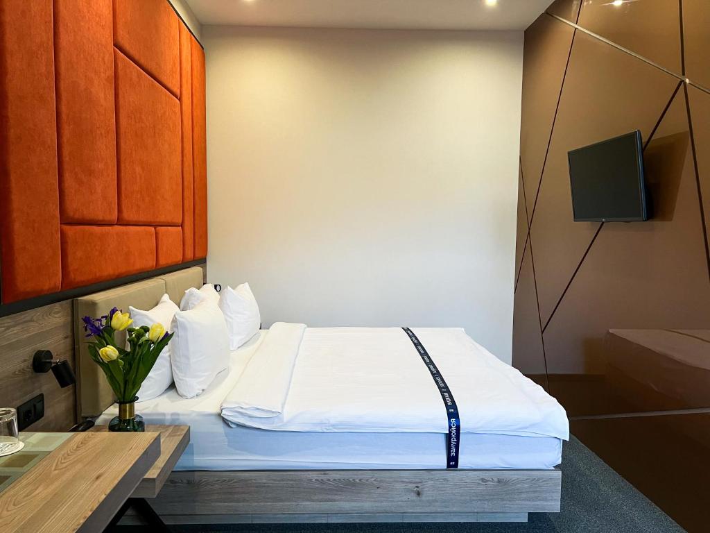 Postel nebo postele na pokoji v ubytování Ribas Rooms Odesa