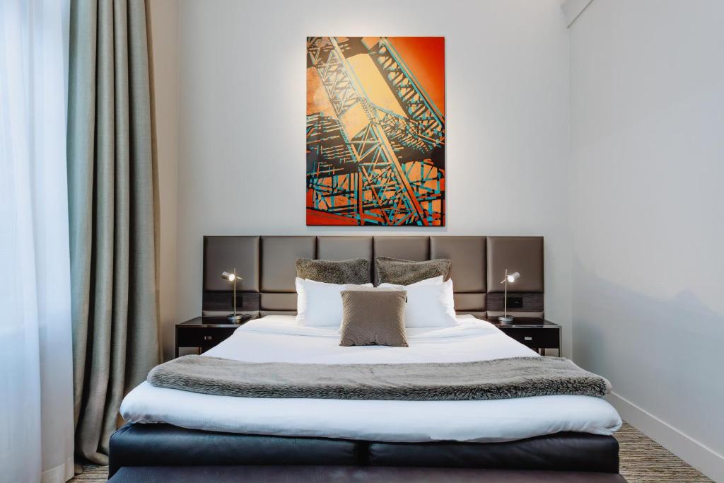 Postel nebo postele na pokoji v ubytování Terhills Hotel