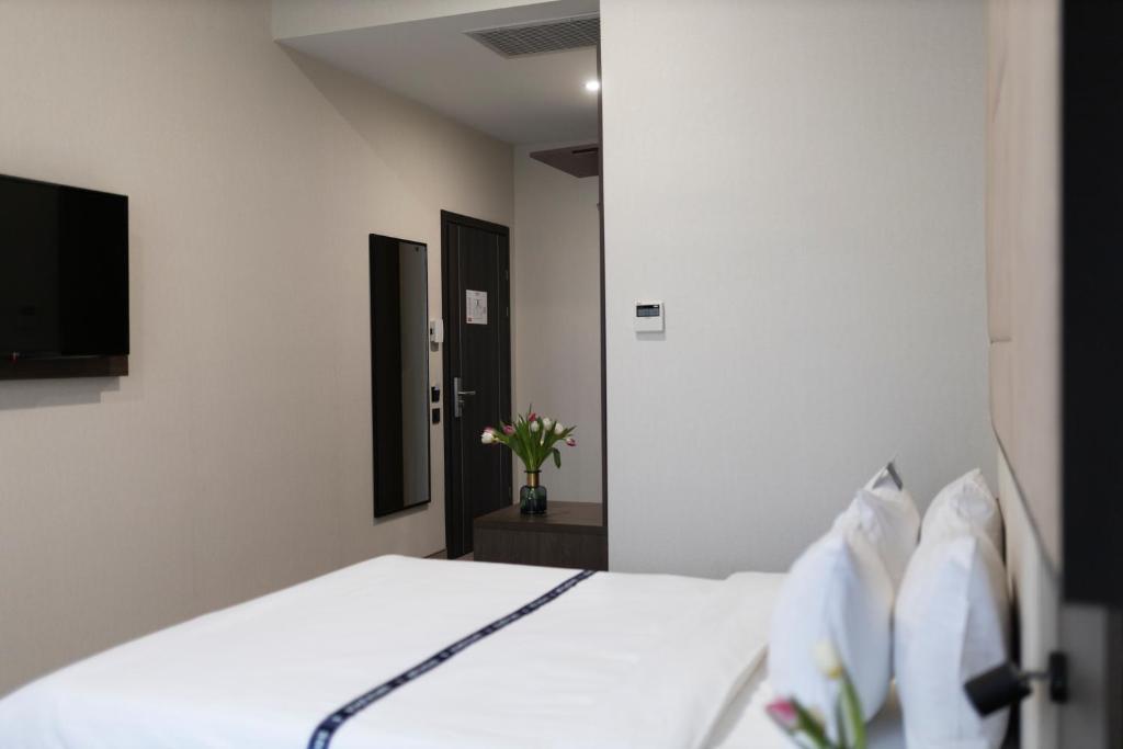 Postel nebo postele na pokoji v ubytování Ribas Rooms Odesa