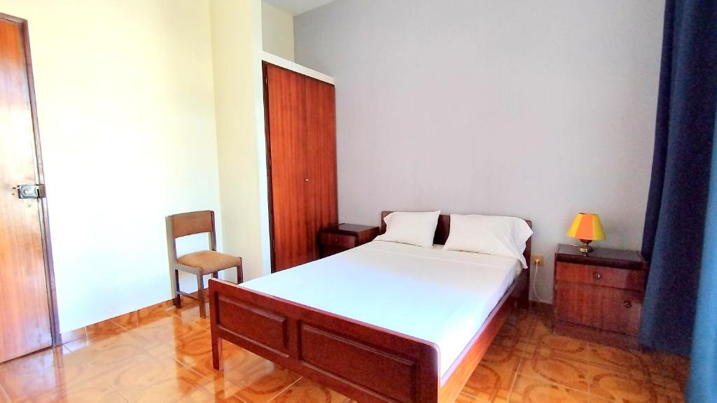 Postel nebo postele na pokoji v ubytování Residencial Amarante
