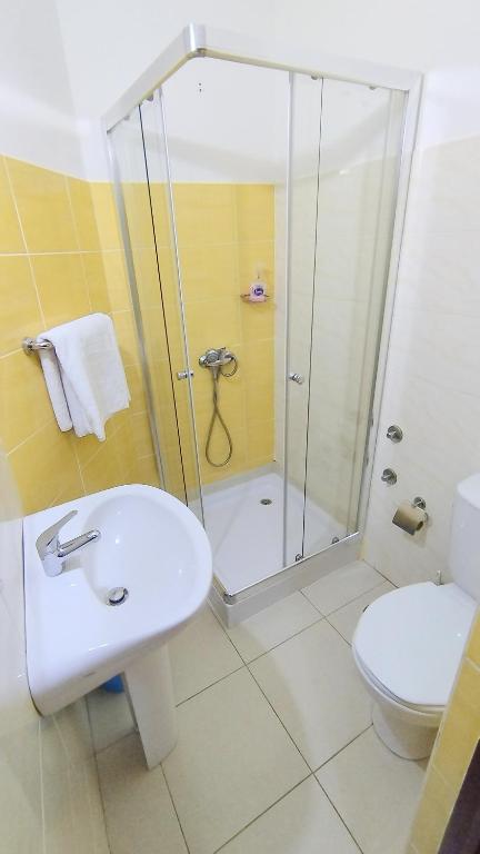 Koupelna v ubytování Residencial Amarante