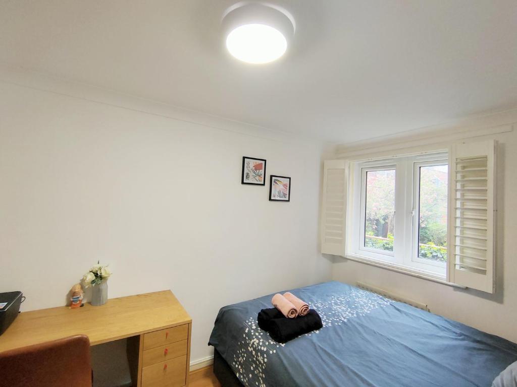 Lova arba lovos apgyvendinimo įstaigoje Spacious 3-Bed Cosy Flat in Westminster