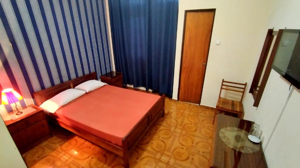 Postel nebo postele na pokoji v ubytování Residencial Amarante