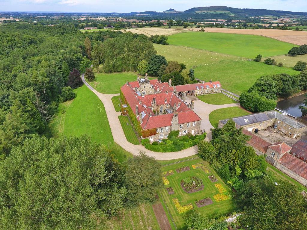 an aerial view of a house with a garden at Finest Retreats - Ingleby Manor - South Front in Great Ayton