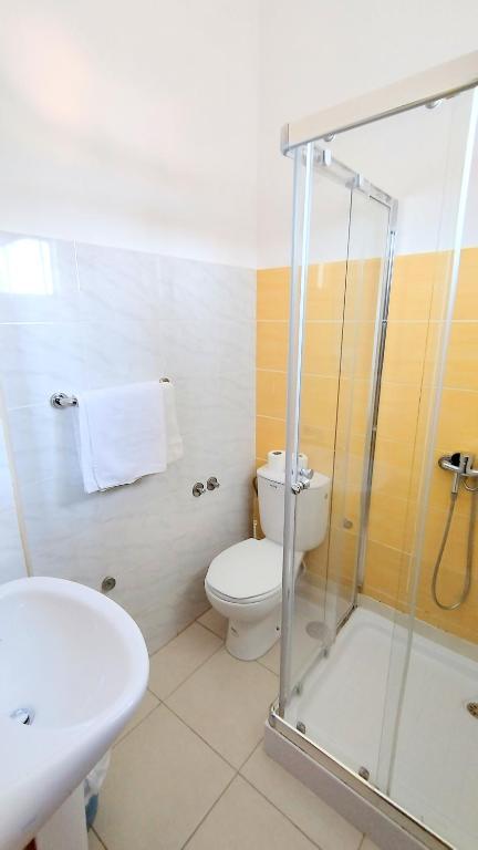 Koupelna v ubytování Residencial Amarante