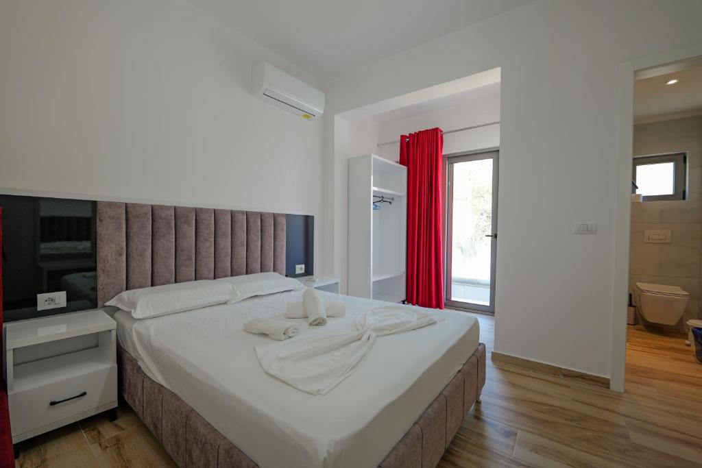 Postel nebo postele na pokoji v ubytování Hotel Take