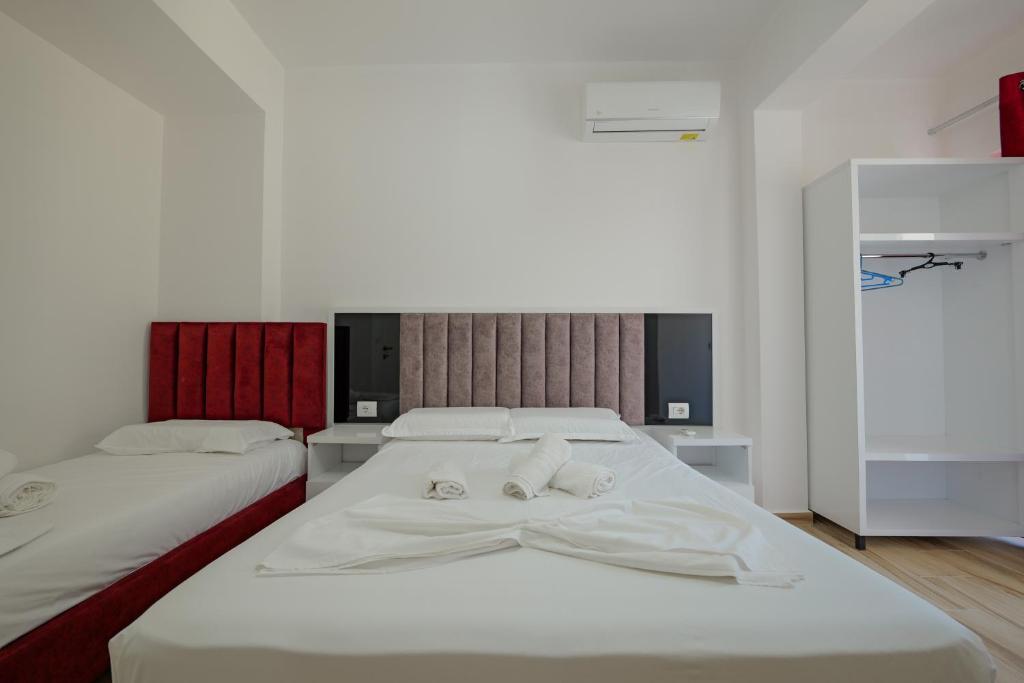 Postel nebo postele na pokoji v ubytování Hotel Take