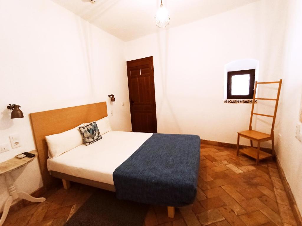 FRENTEABASTOS Boutique - Habitación Cuádruple