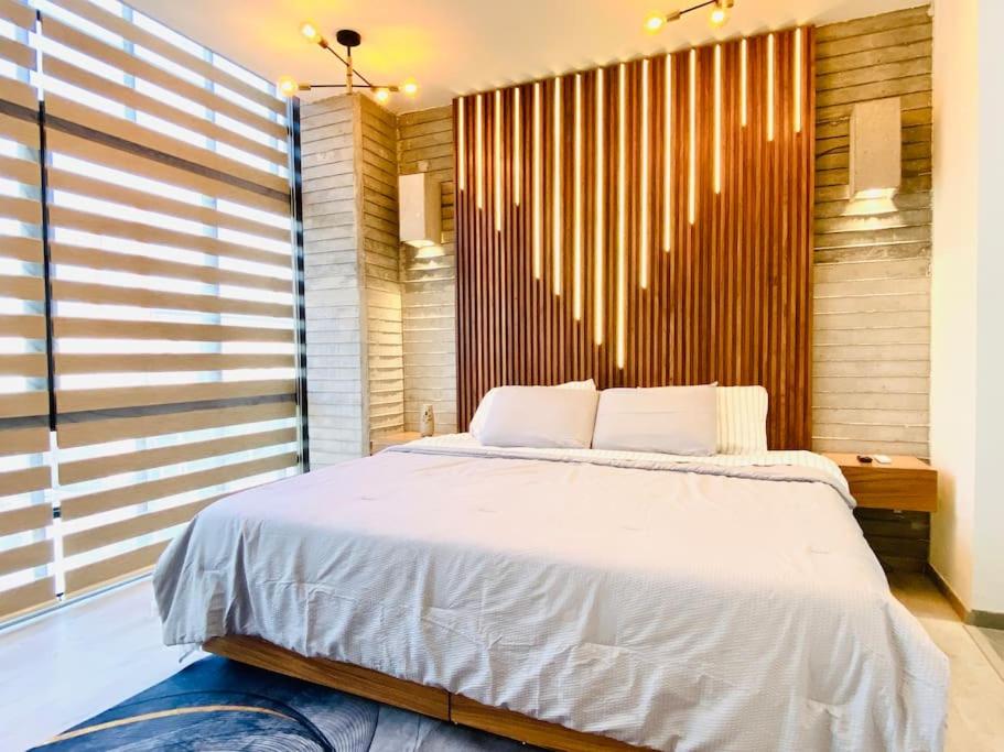 Postel nebo postele na pokoji v ubytování Luxurious and Modern Apartment in North Zone