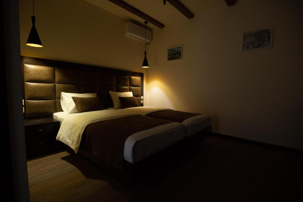 Postel nebo postele na pokoji v ubytování Boutique Living Hotel