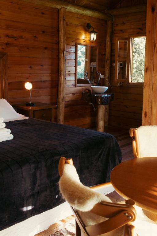 Posezení v ubytování Hospedaria Refugio do Invernador
