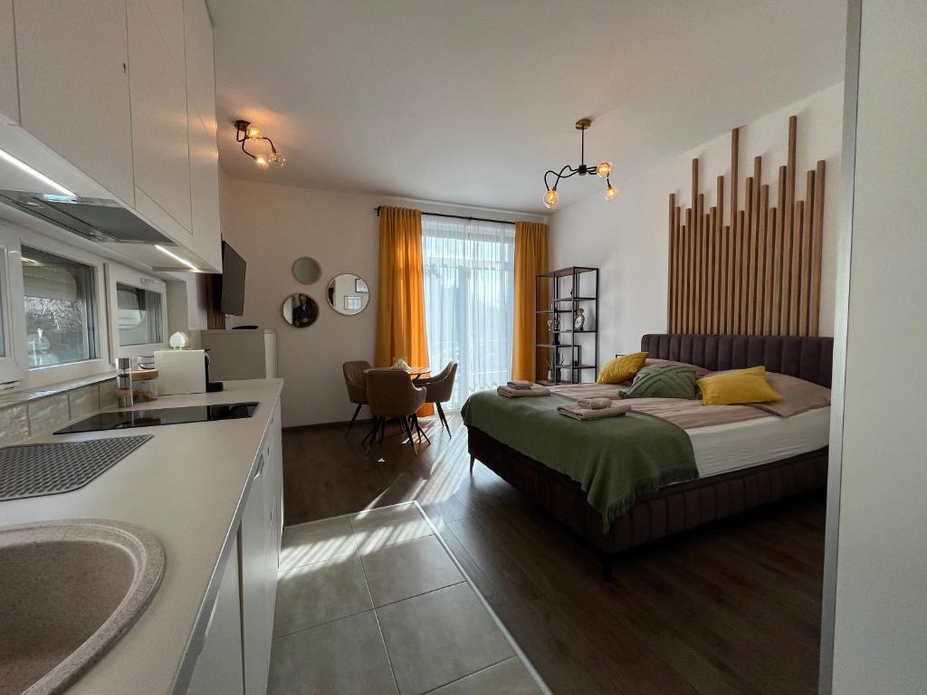 Posteľ alebo postele v izbe v ubytovaní Hillside Central Apartments