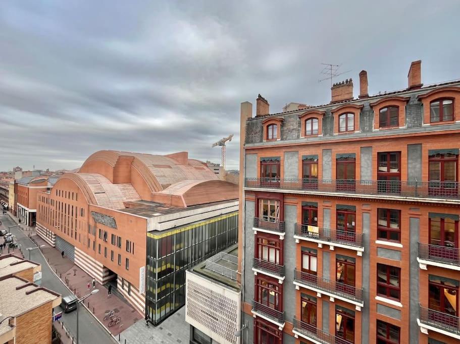 Vue de tête d'une ville avec des bâtiments dans l'établissement Grand studio en hyper-centre, à Toulouse