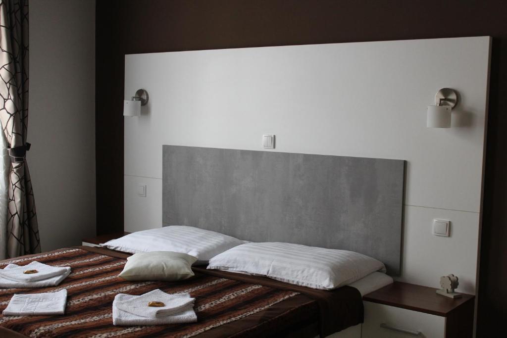 Postel nebo postele na pokoji v ubytování Apartments Verona Karlovy Vary