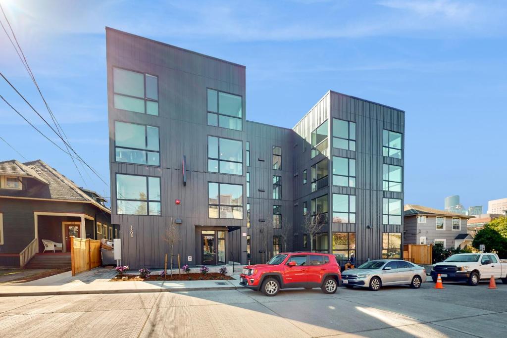 a red car parked in front of a building at Marion Hideaway in Seattle