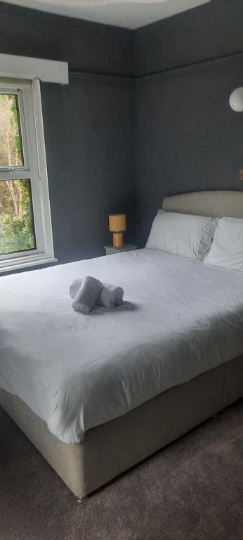 Postel nebo postele na pokoji v ubytování Boutique Guest House