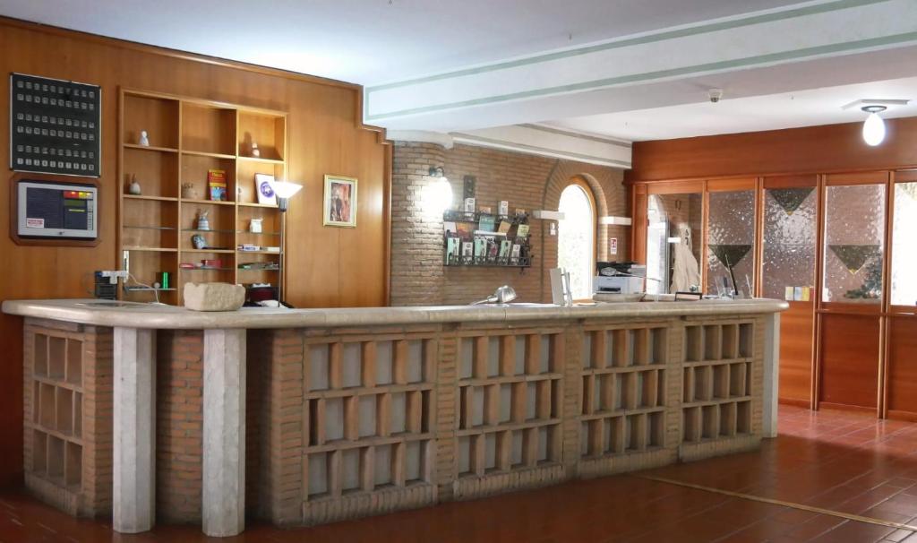 Hol lub bar w obiekcie LH Albergo il Picchio