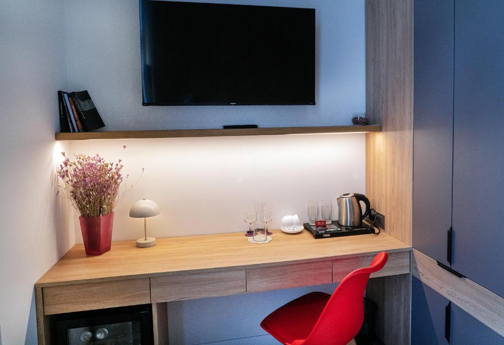 TV a/nebo společenská místnost v ubytování Erkan Alek Heritage Hotel