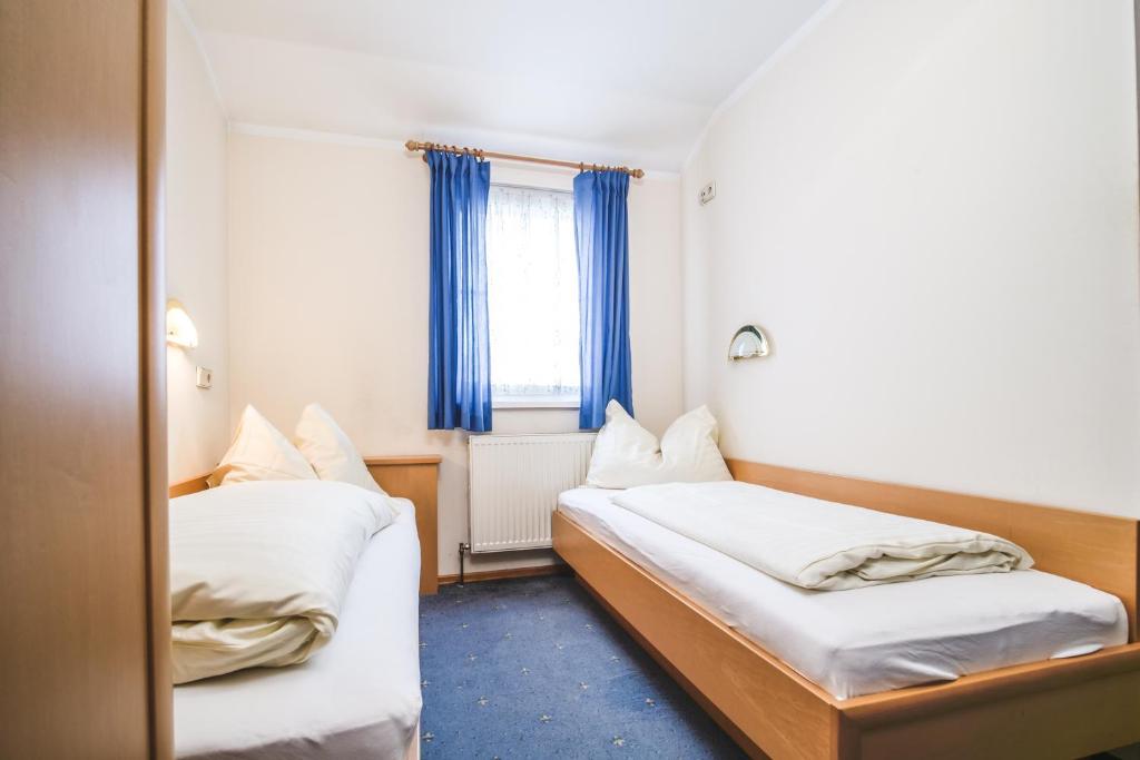 Postel nebo postele na pokoji v ubytování Landhaus Gretl by S4Y