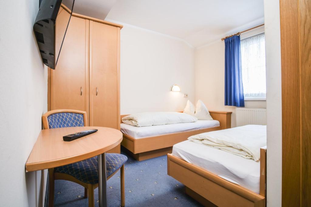 Postel nebo postele na pokoji v ubytování Landhaus Gretl by S4Y