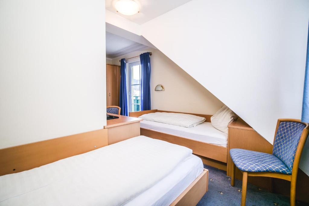 Postel nebo postele na pokoji v ubytování Landhaus Gretl by S4Y