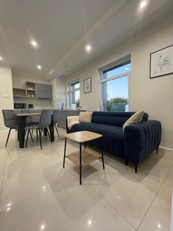 Χώρος καθιστικού στο Copernicus Sky Apartment