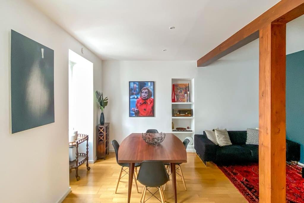 a living room with a table and a couch at Lisbon deluxe city center flat in Lisbon